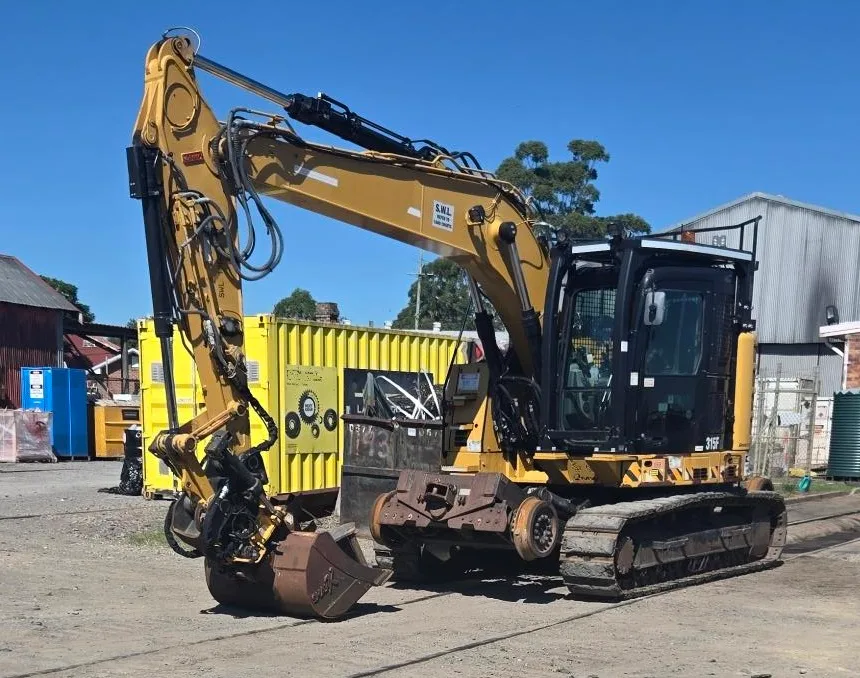 2018 CAT 315FL CR Hi-Rail Excavator with Attachments